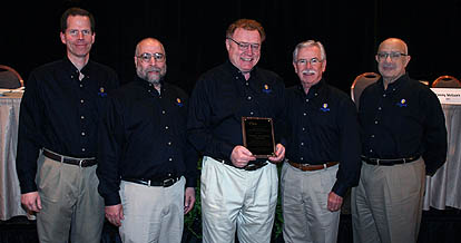 Don Gudeczauskas, Technical Director; Mario Orduz, Product Manager; Don Walsh, Director of  Operations; Tony Revier, President; and George Milad, National Accounts Manager, accept the  Peter Sarmanian Award, bestowed by IPC at the organization&rsquo;s annual conference March 31.  The award recognized Uyemura&rsquo;s long history of technical and management leadership.