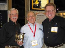 Uyemura USA President Tony Revier (left) and  Director of Operations Don Walsh (right) congratulate West Coast Sales Manager  Arnie Kremer on his 10 years of service to the company.
