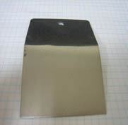 Fig. 16b Generic Semi-bright mid-phosphorus  Electroless Nickel Aluminum: 3003 H14 Bath Age: 3 MTO Plate Thickness: One mil Failed Bend and Tape Test (Left Edge)